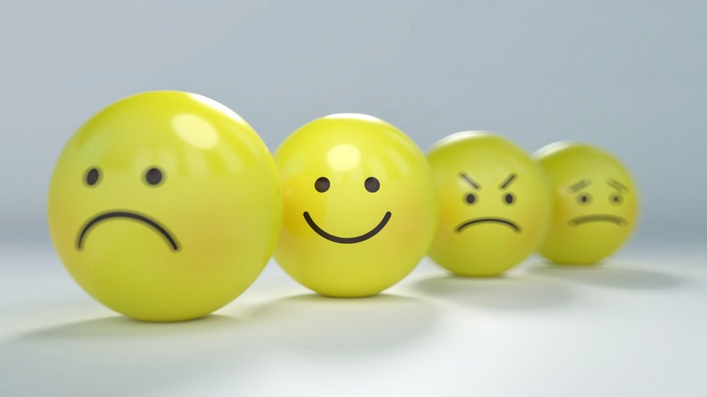 yellow balls showing different emotional expressions