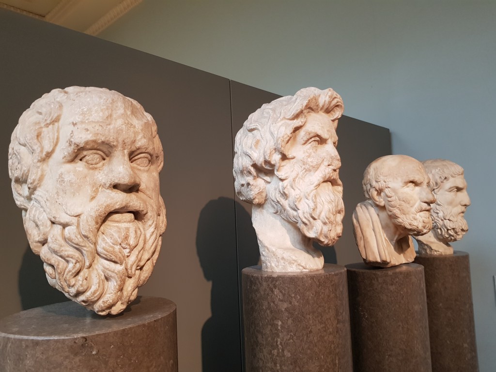 picture of four busts of ancient Greek philosophers in the British Museum